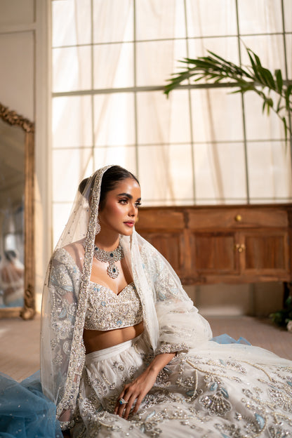 Noorie - White and ice blue lehnga choli