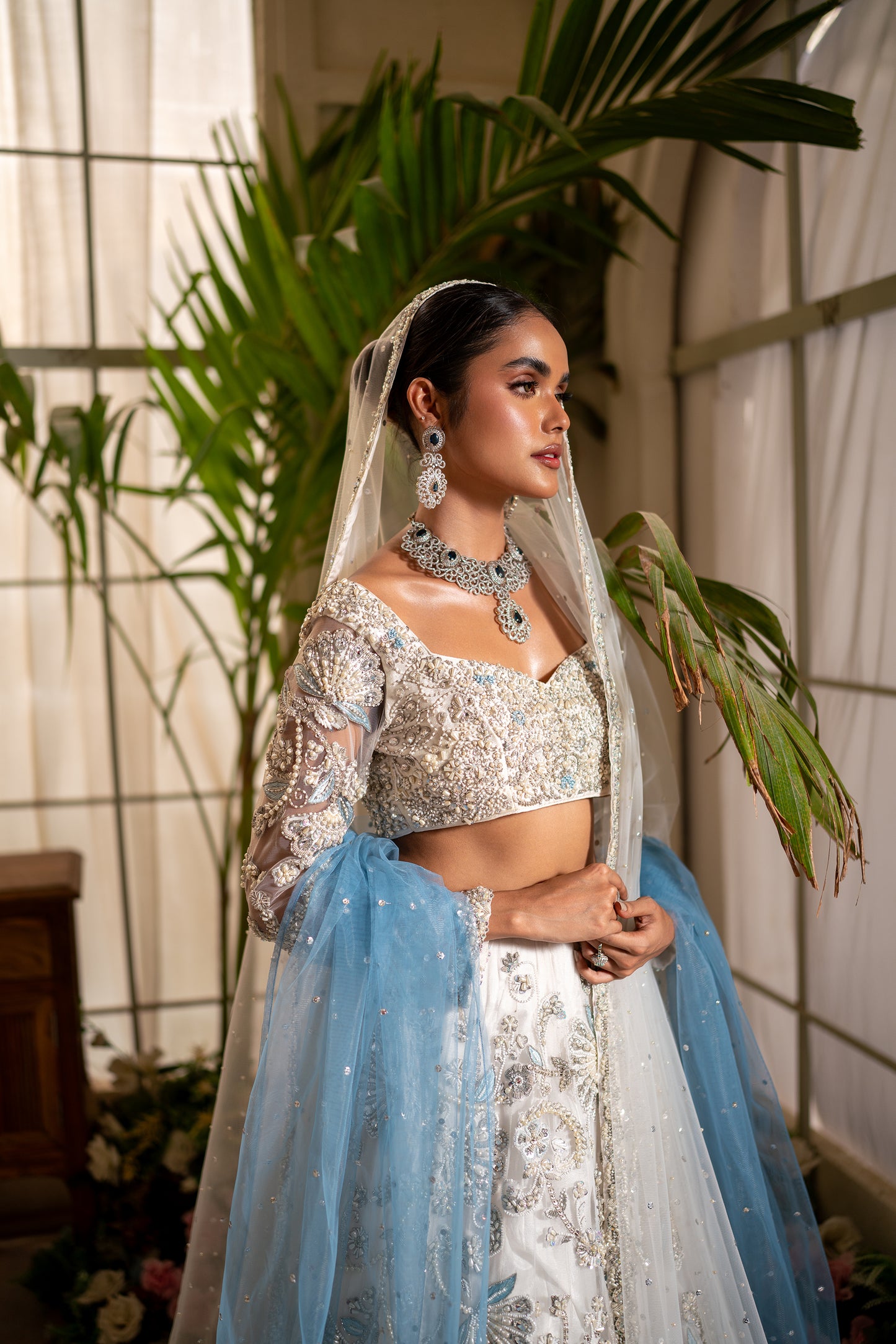 Noorie - White and ice blue lehnga choli