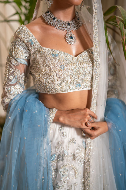 Noorie - White and ice blue lehnga choli